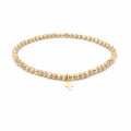 Luxe Cross Bracelet in CHAMPAGNE